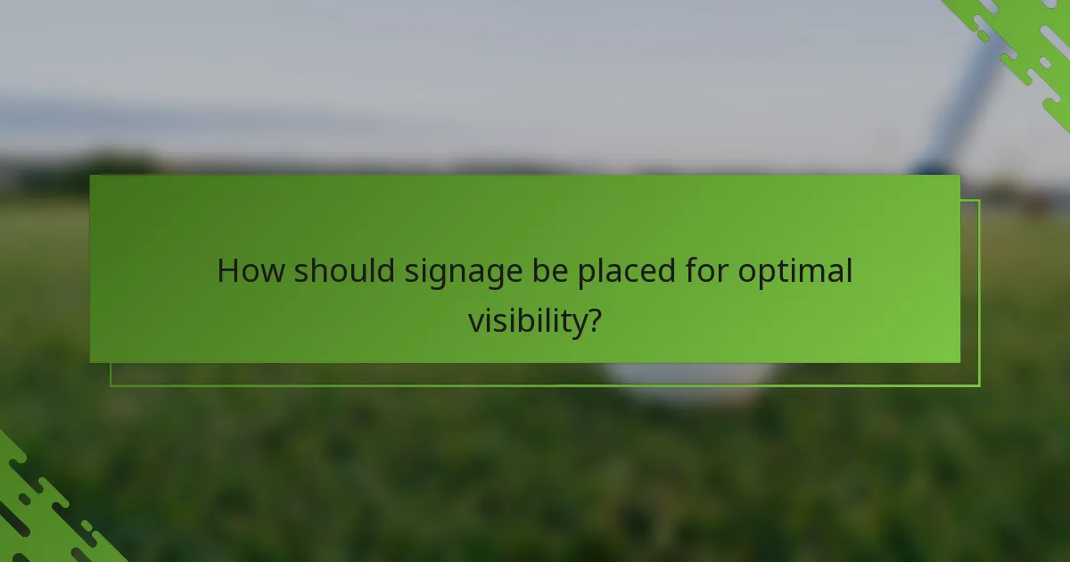 How should signage be placed for optimal visibility?